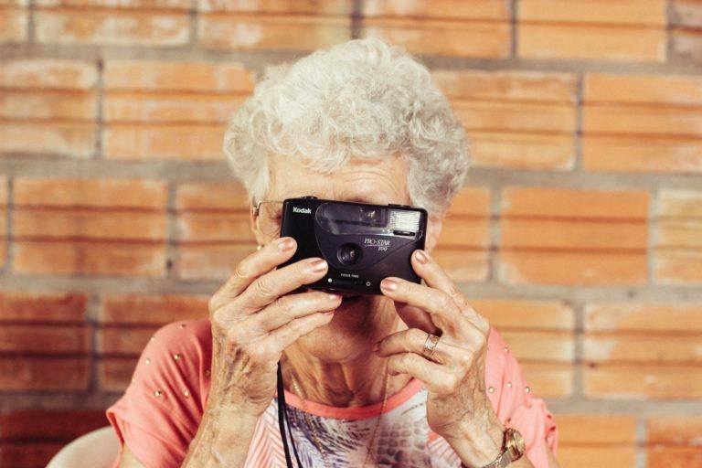 a person holding a camera