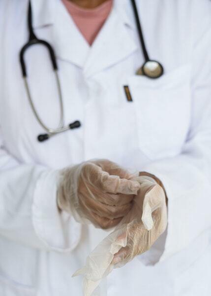a doctor looking at a patient