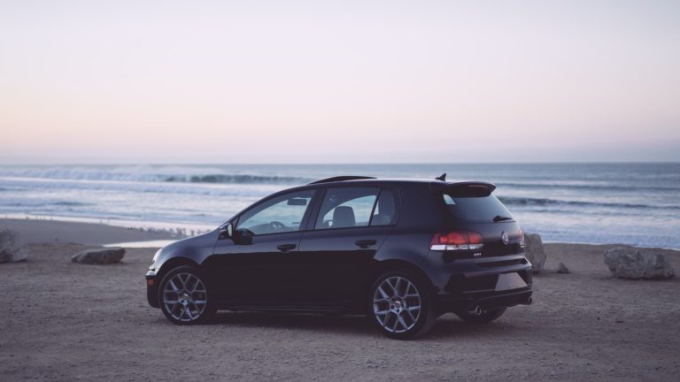 a car parked on a beach