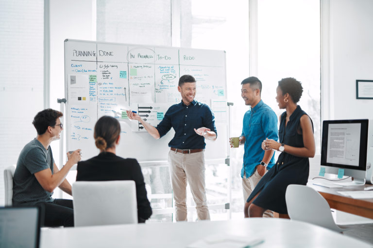 a group of people in a meeting