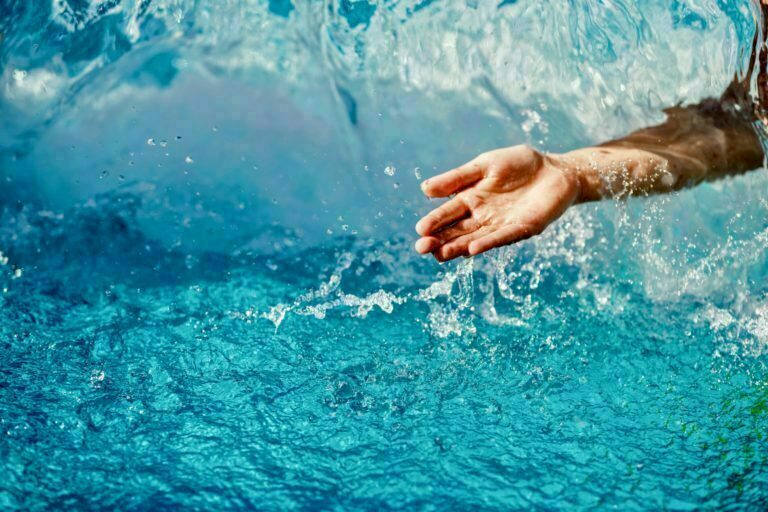 a person's feet in the water