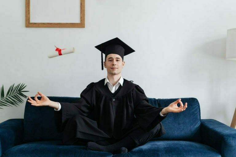 Caucasian young man feeling very excited to receive his bachelors degree