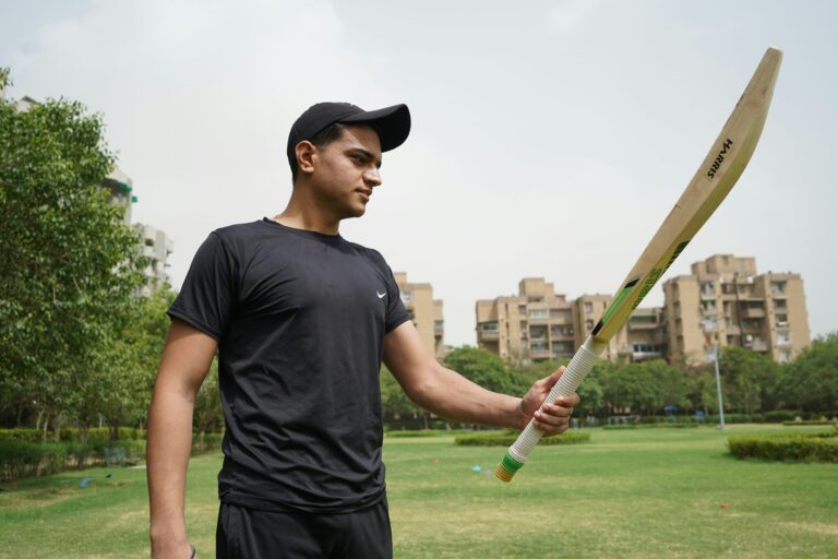 a man holding a golf club